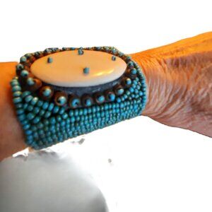 Hand Beaded cuff, Vintage Boho.  Turquoise glass beads w. natural stone disc.